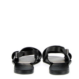 Crossed flat black leather sandal