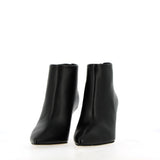 Stivaletto zippato dietro in nappa nero