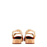 Low nude patent slingback with straps