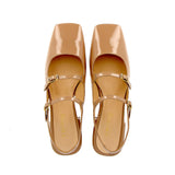 Low nude patent slingback with straps