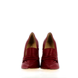 Pointed toe moccasin in burgundy leather with wedge