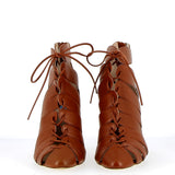 Leather sandal with lace-up heel