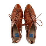 Leather sandal with lace-up heel