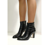 Black shiny leather ankle boot with zip and heel