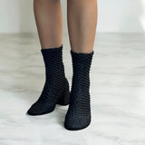 Stivaletto morbido nero elasticizzato e ricamato
