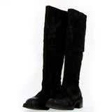 Boot in soft black suede with leather toe
