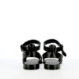 Sandalo flat in pelle nera con cinturino