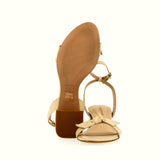 Sandalo tacco medio in pelle nude con fiocchetto