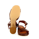 Brown leather medium heel sandal with raw cut