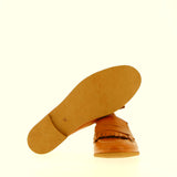 Leather moccasin with fringe