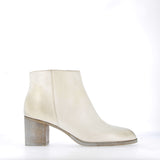 Zipped white leather ankle boot