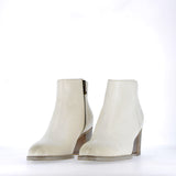 Zipped white leather ankle boot