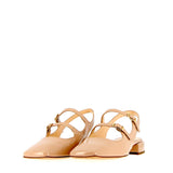 Low nude patent slingback with straps