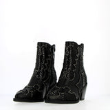 Black ankle boot and studded snake