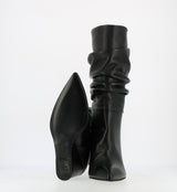 Black tube boot with curl