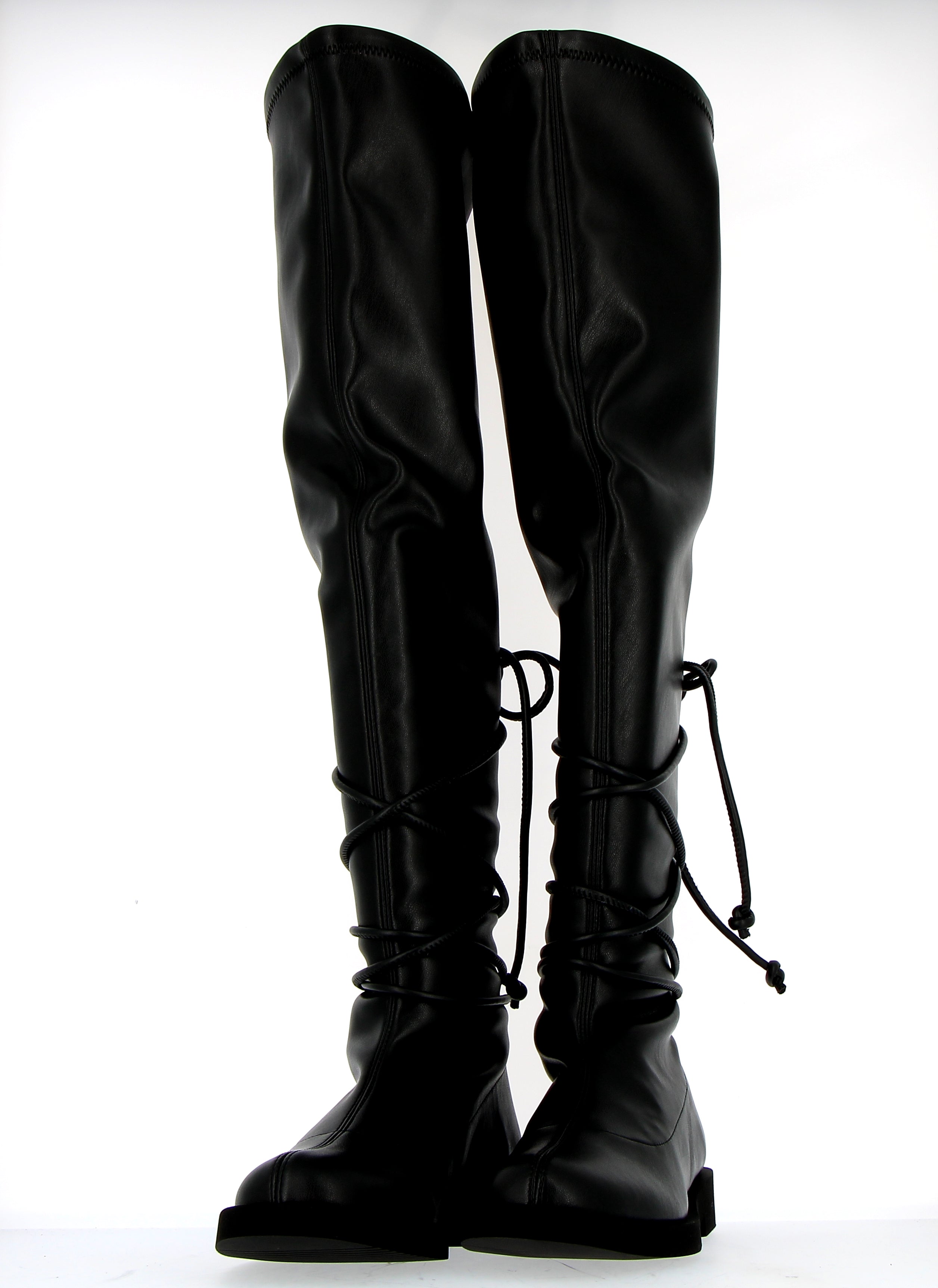 Black stretch cuissard boot laced on ankle