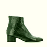 Ankle boot in soft green patent leather with side zip