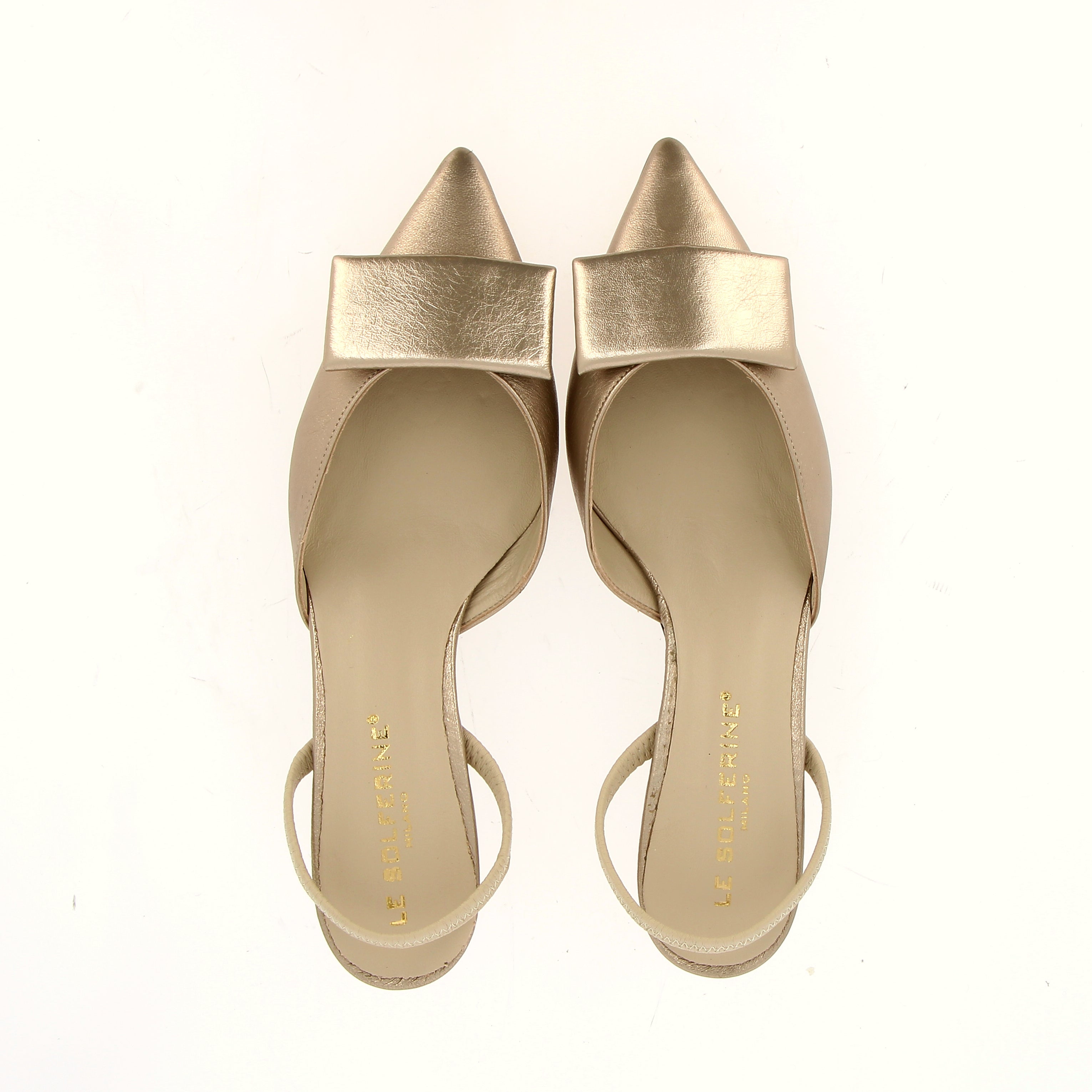 Sling back in unlined platinum nappa leather with low heel