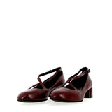 Ballerina with crossed straps in soft burgundy leather