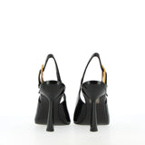 Black naplack slingback with golden buckle