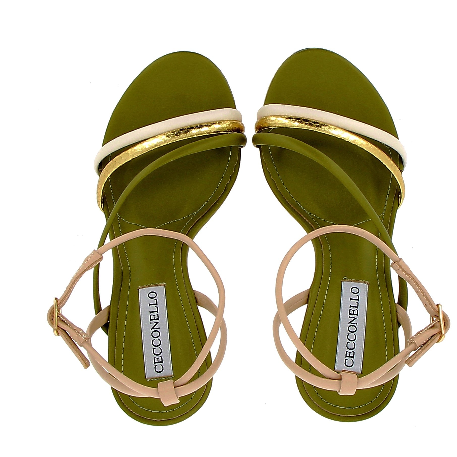 Green and gold high sandal on a gold background