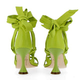 Acid green sandal with bow fastening