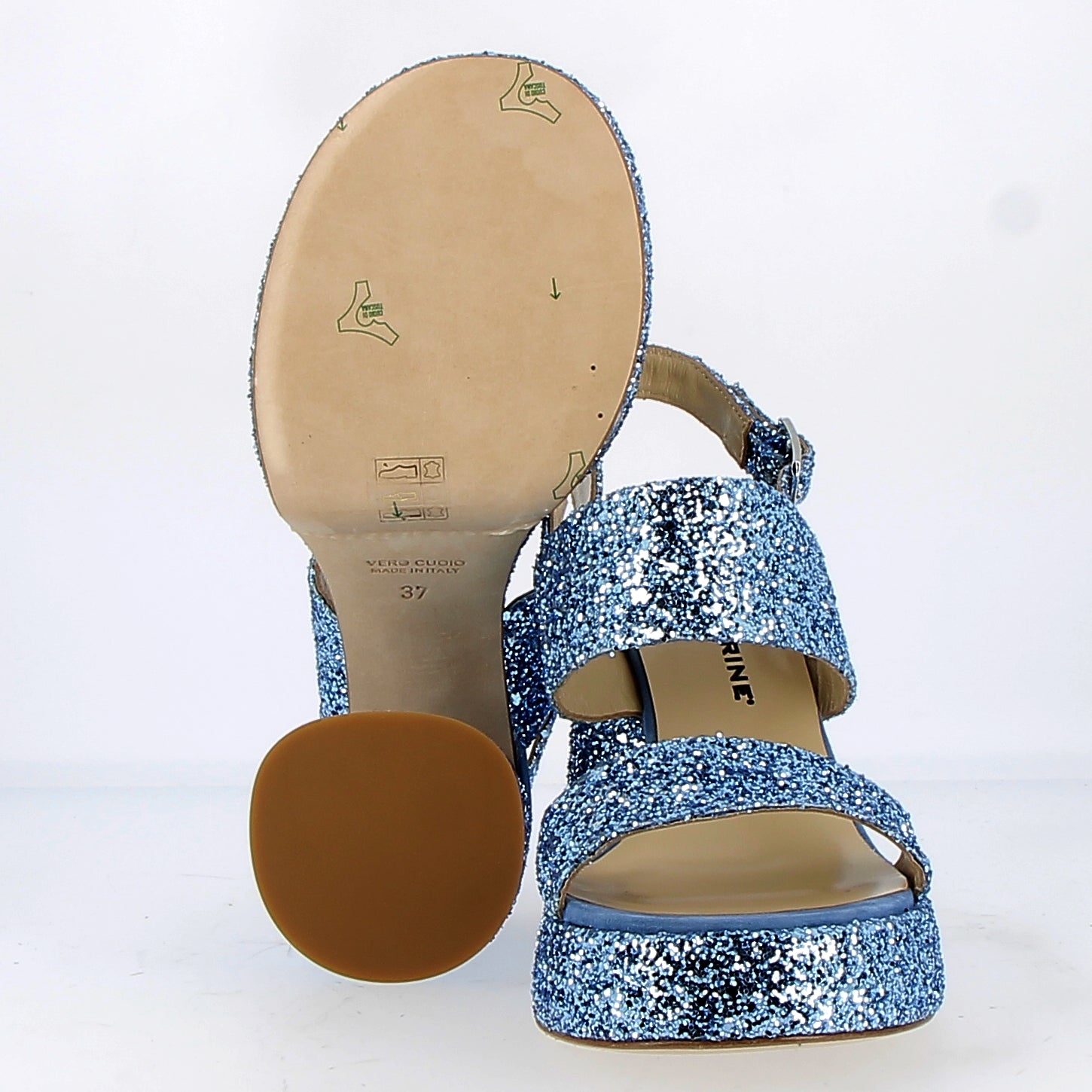 Sandal in light blue glitter with plateau