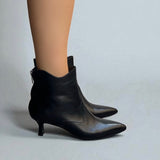 Black leather ankle boot with 55mm heel.