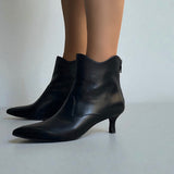 Black leather ankle boot with 55mm heel.