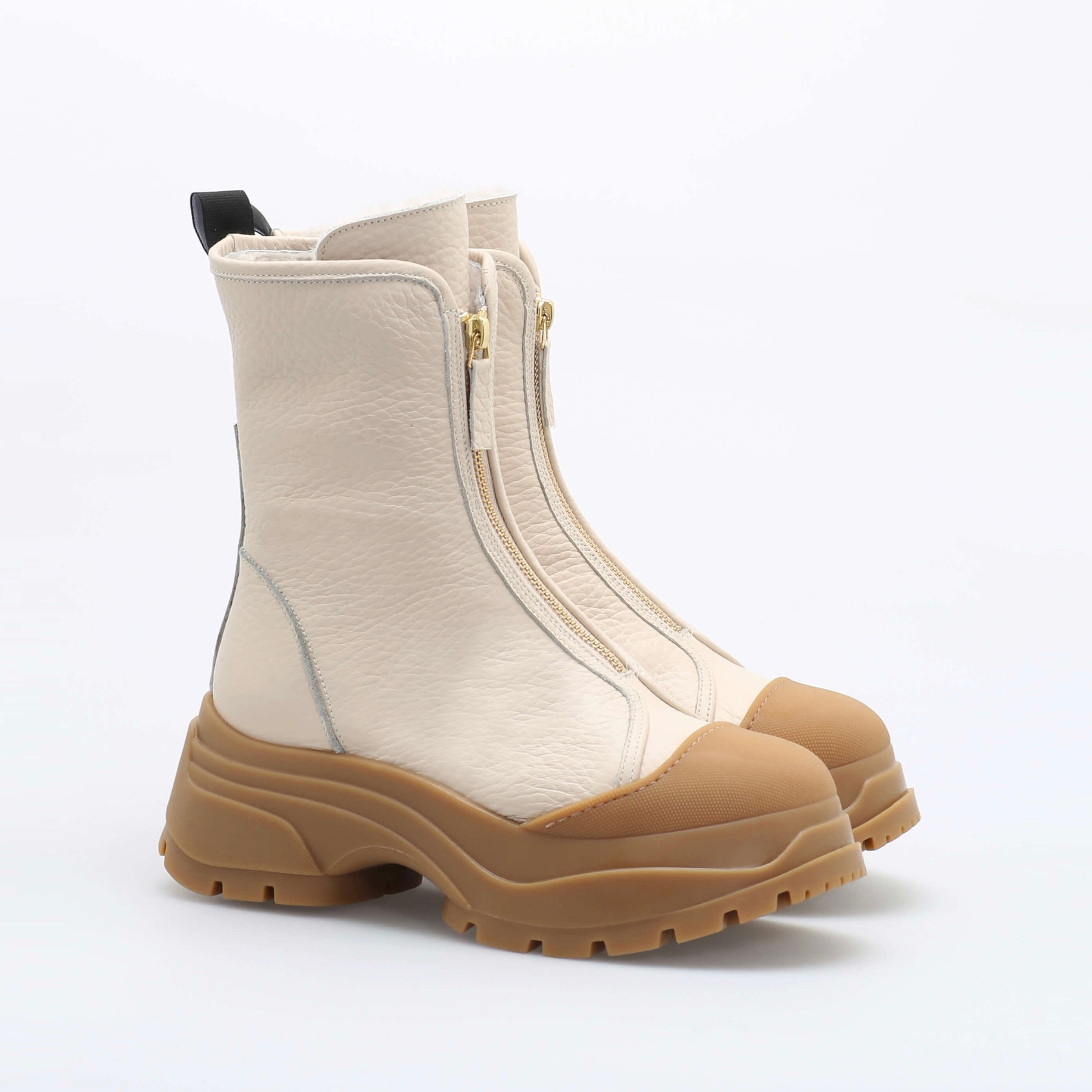 White sheepskin ankle boot with rubber sole