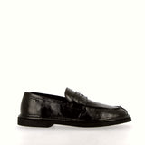 Dark chocolate-colored moccasin in supersoft nappa leather.