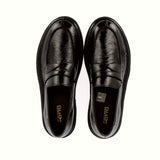 Dark chocolate-colored moccasin in supersoft nappa leather.