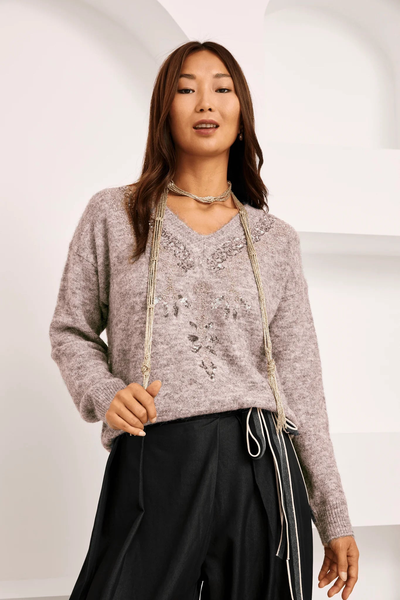 Maglione con paillettes