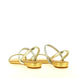 Flat sandal in champagne silver laminated leather