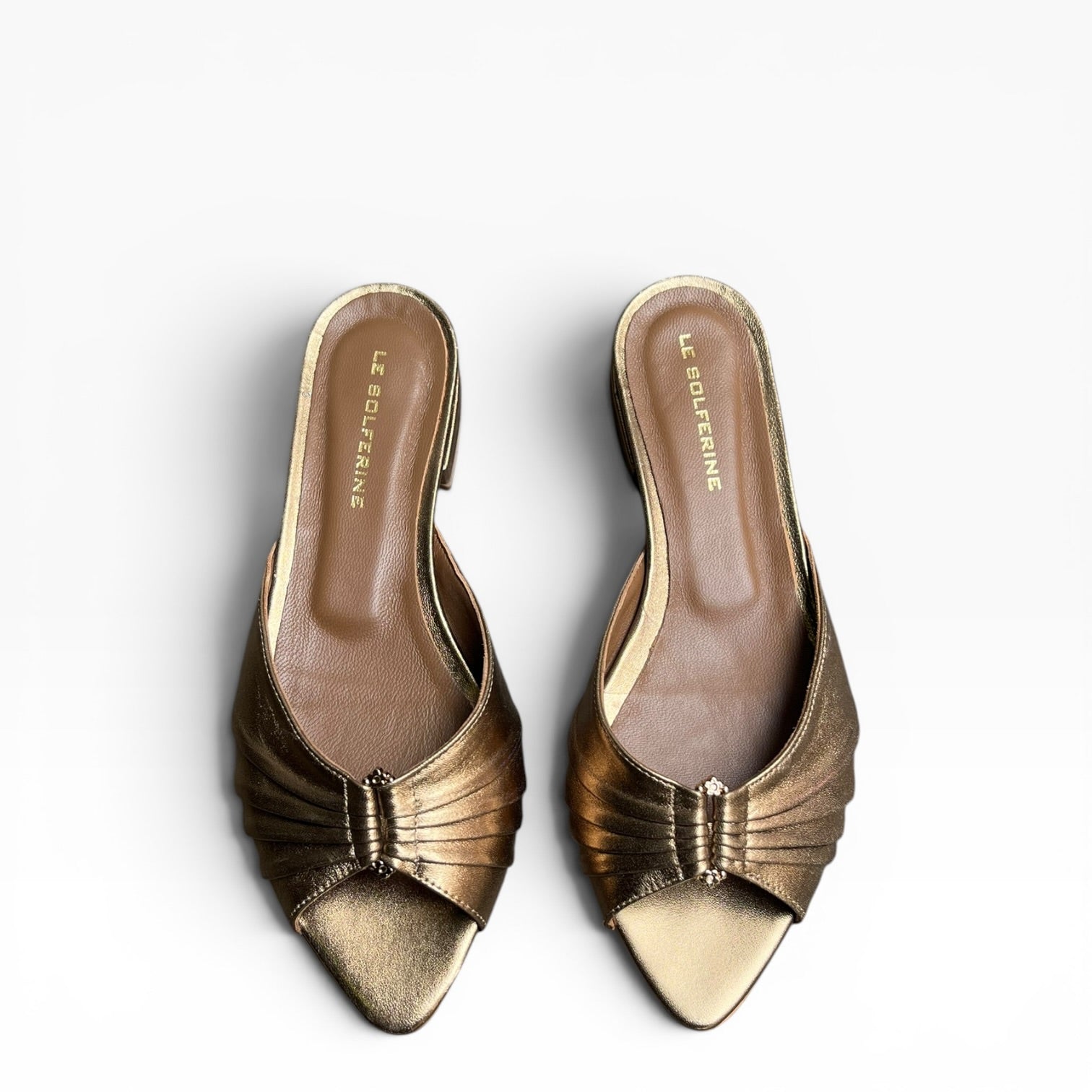 Mule a punta con tacco basso in pelle bronzo