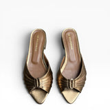 Mule a punta con tacco basso in pelle bronzo