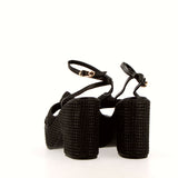 Sandalo nero in raffia con plateau