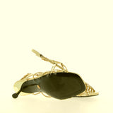 Sandalo in pelle platino a treccine