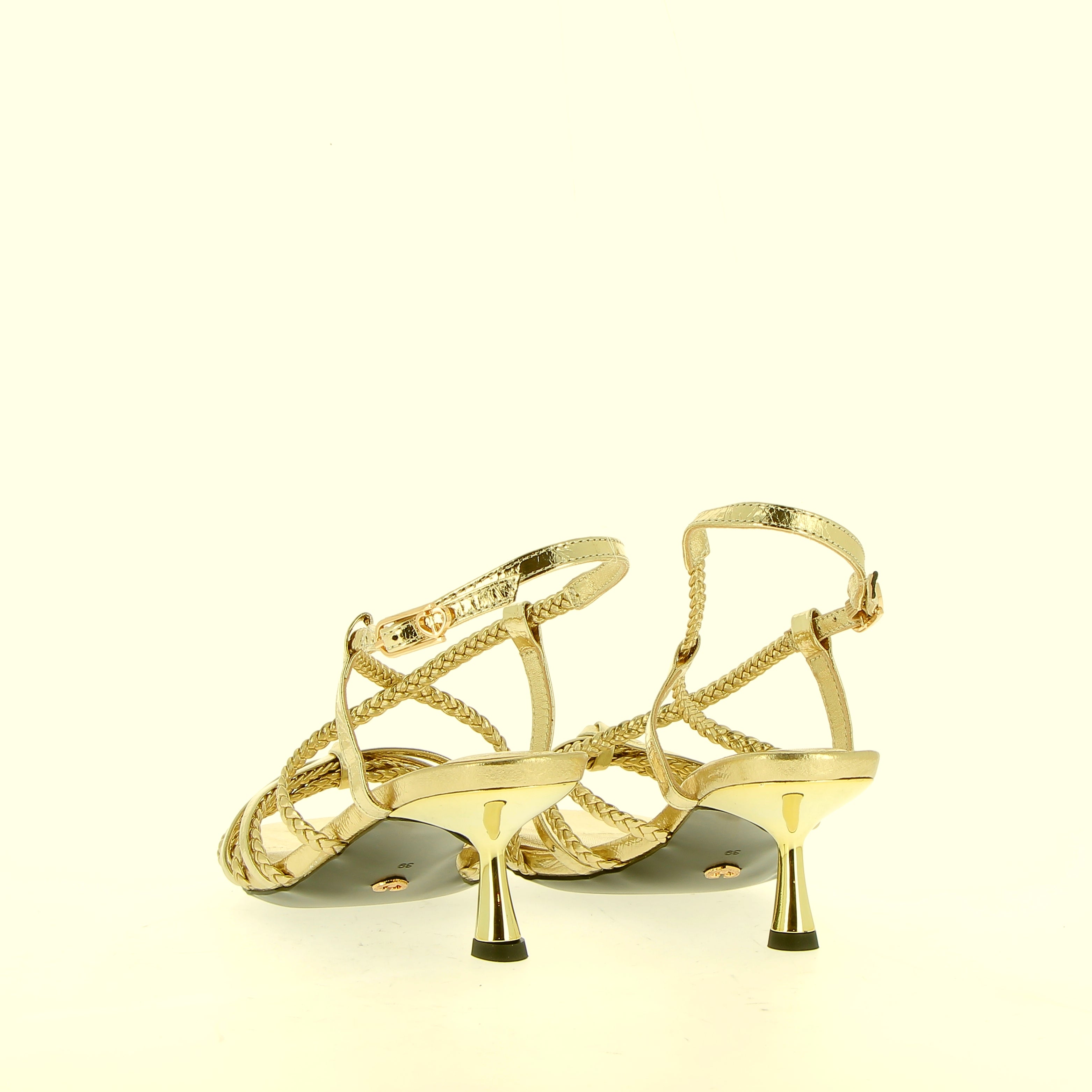 Sandalo in pelle platino a treccine