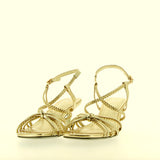 Sandalo in pelle platino a treccine