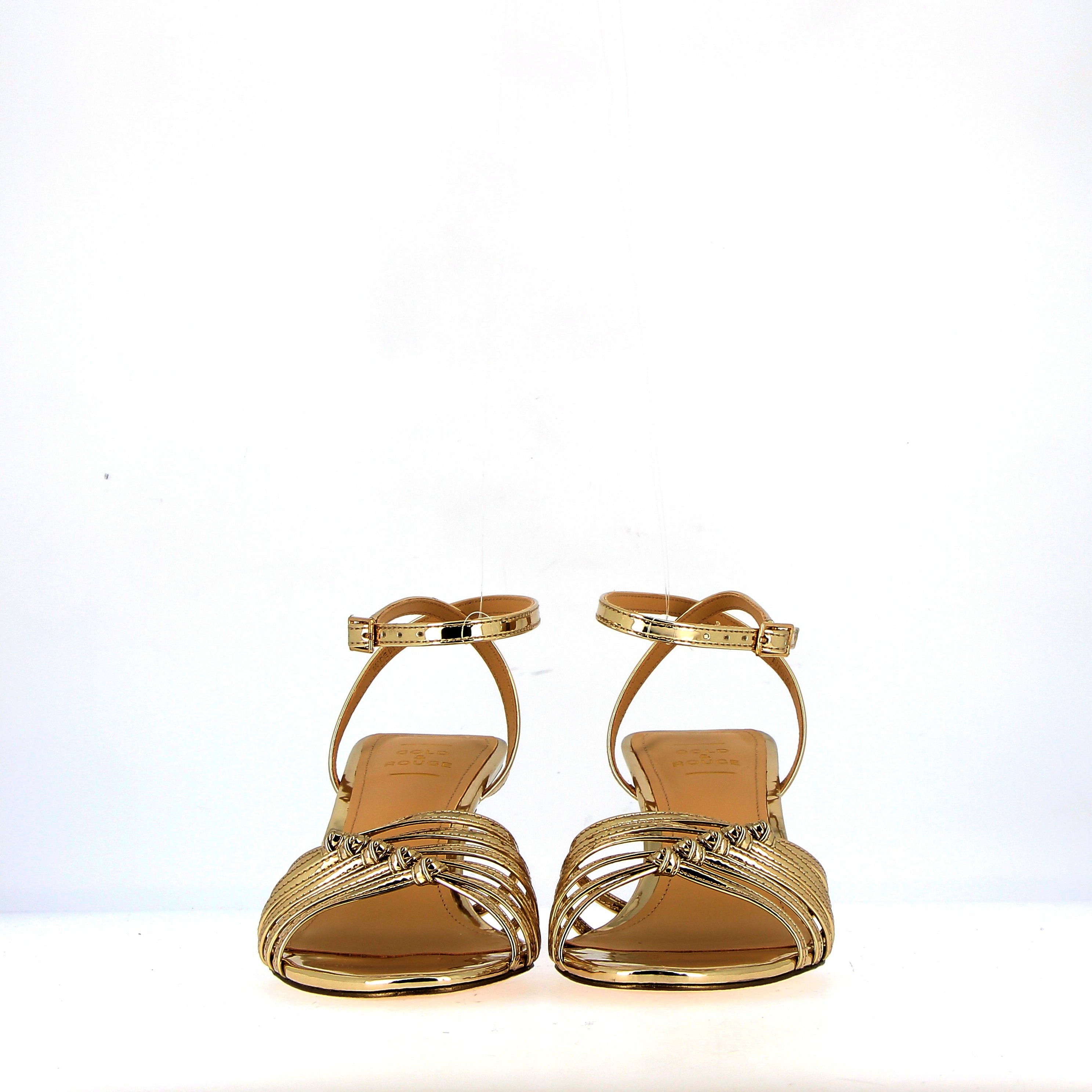 Medium heel sandal in gold leather with laces