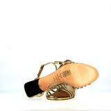 Sandalo tacco medio in pelle oro a laccetti