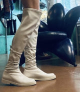 White stretch cuissard boot laced on ankle