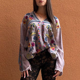 Gray tunic with floral embroidery