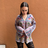 Gray tunic with floral embroidery