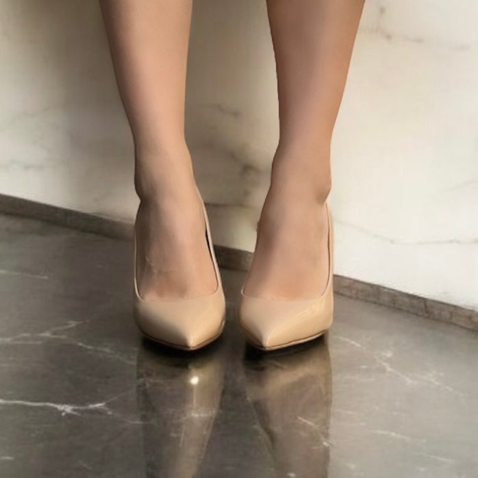 High heel decollete in nude patent leather