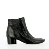 Retro ankle boot with buttons in soft black patent leather