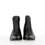 Retro ankle boot with buttons in soft black patent leather