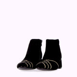 Black suede ankle boot with white motifs