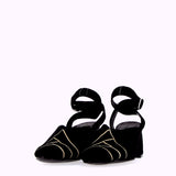 Sling back in black suede with white motifs